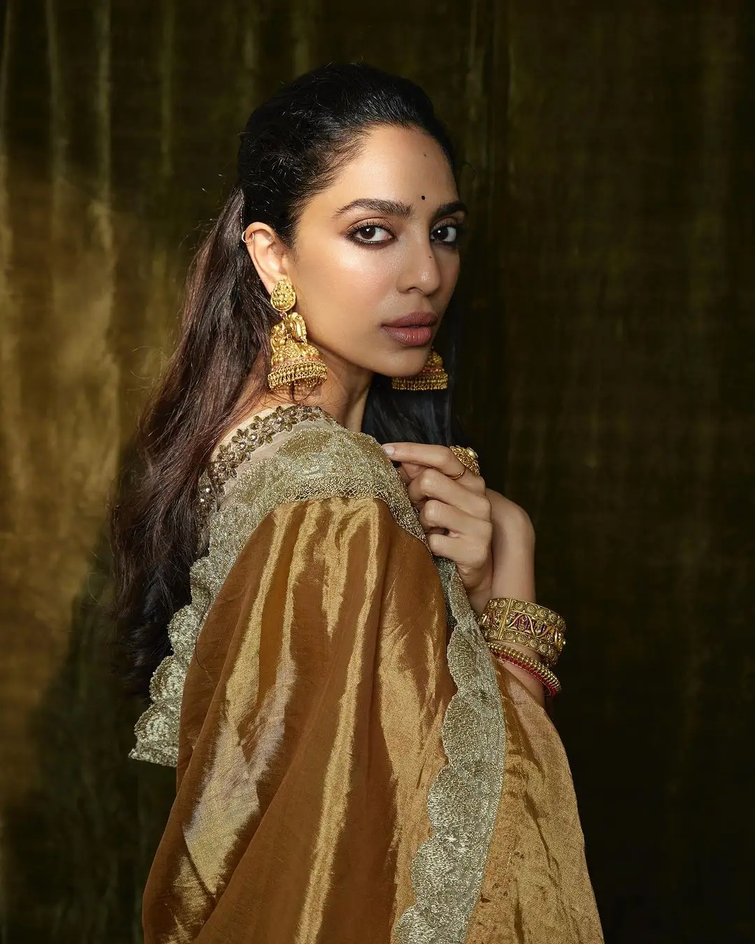 Sobhita Dhulipala Wearing Beautiful Earrings Jewellery Orange Saree Blouse